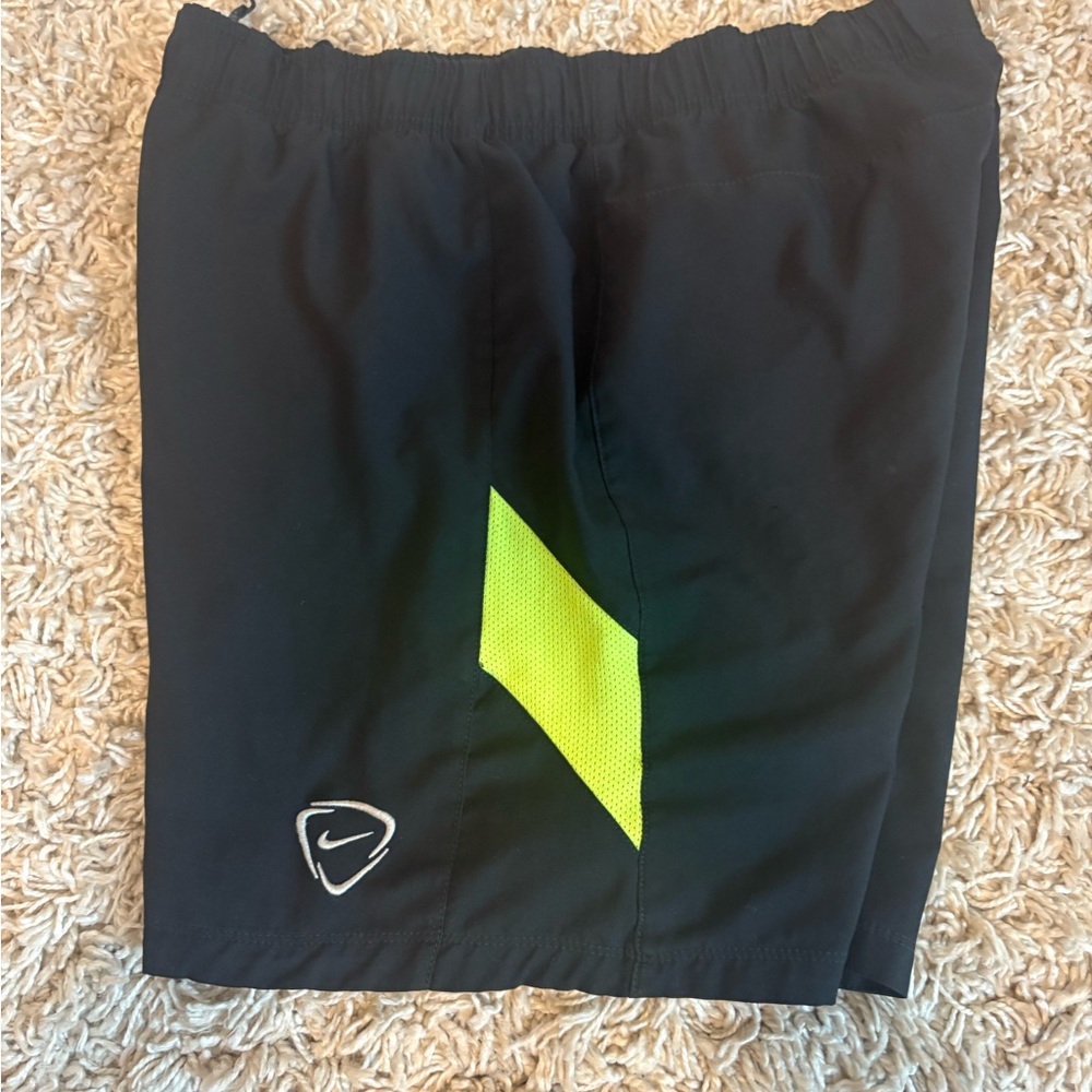 Nike T90 black shorts w/ highlighter yellow accent, size medium, good condition